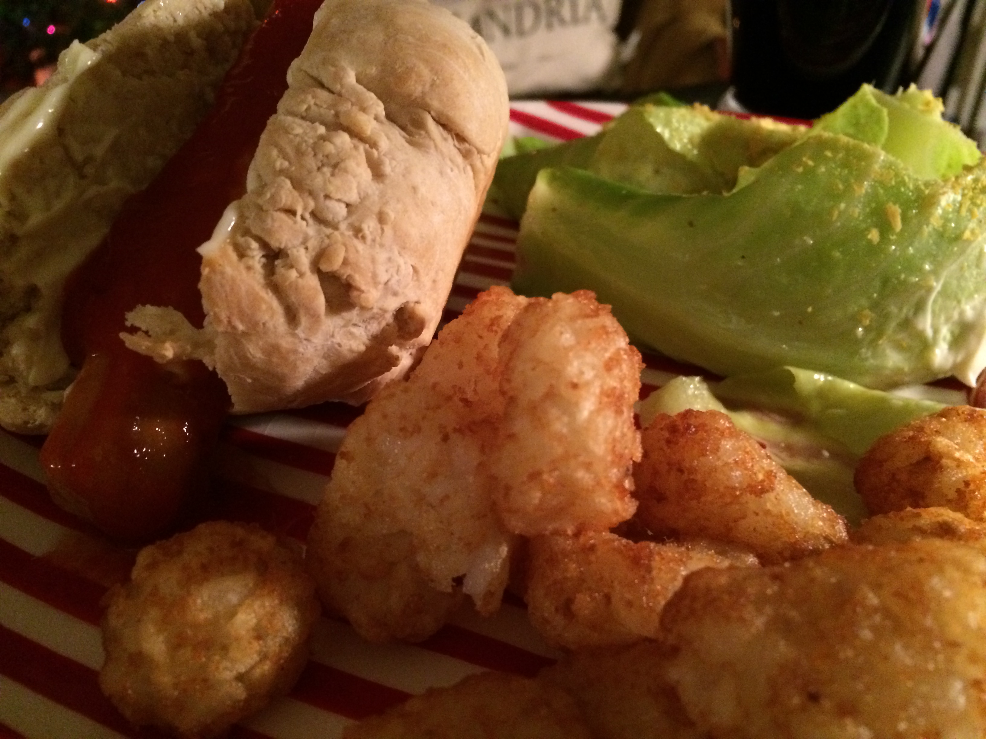 Sunday Cookin Veggie Dogs With Cabbage and Tater Tots.